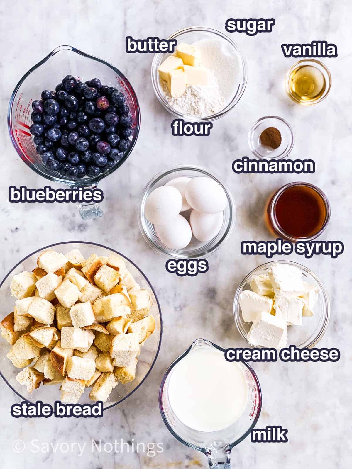ingredients for blueberry French toast casserole with text labels