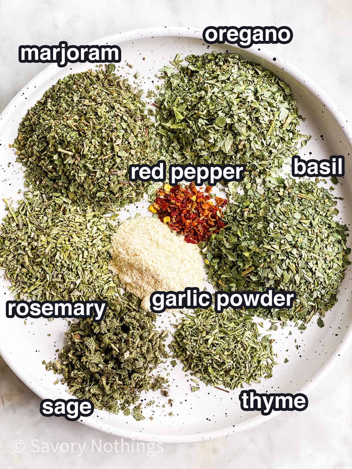 ingredients for homemade Italian seasoning with text labels