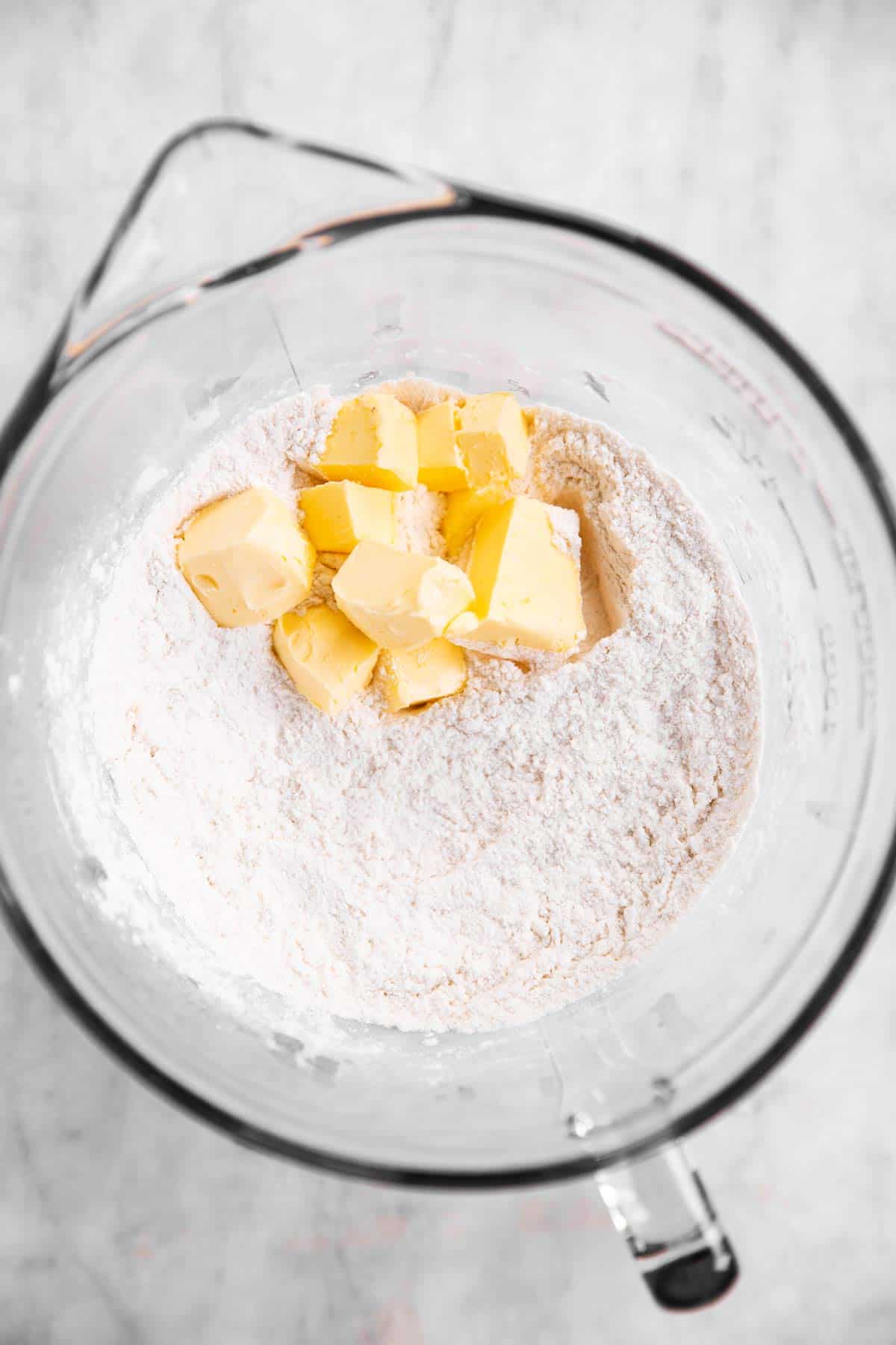 flour and butter in glass bowl