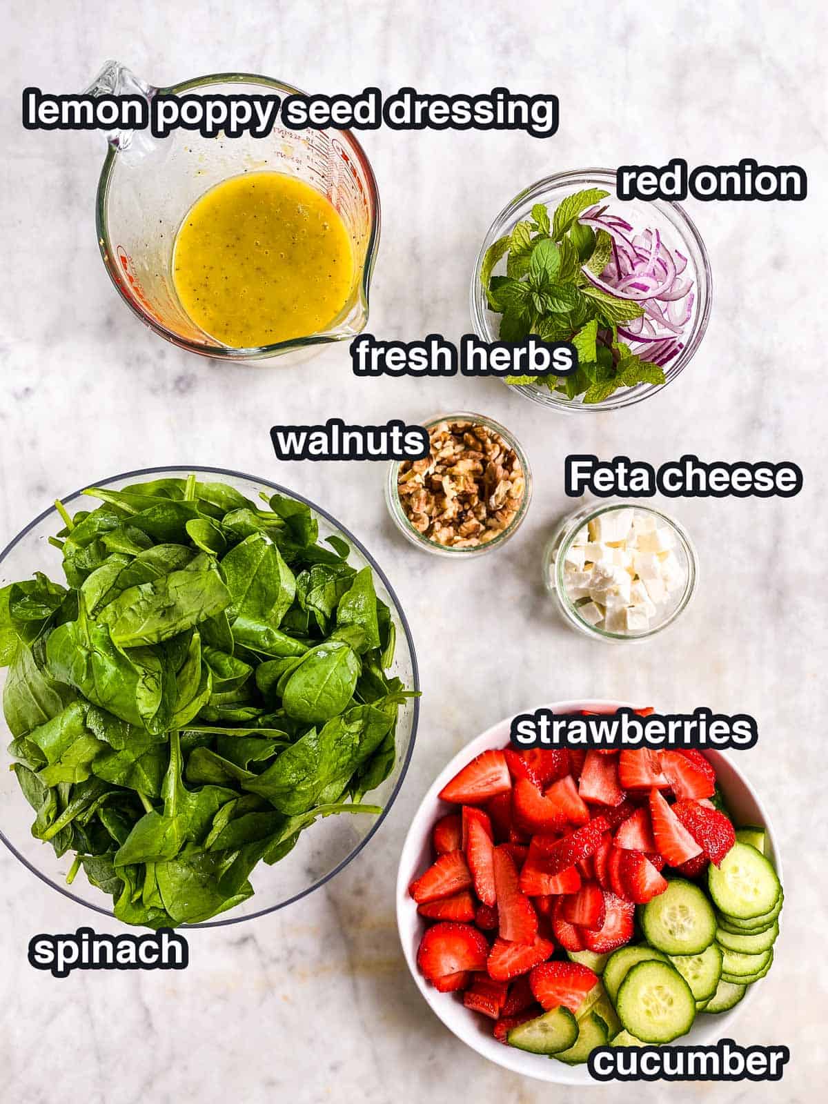 ingredients for strawberry spinach salad with text labels