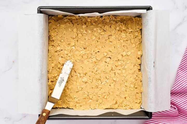Oatmeal cookie batter in pan.