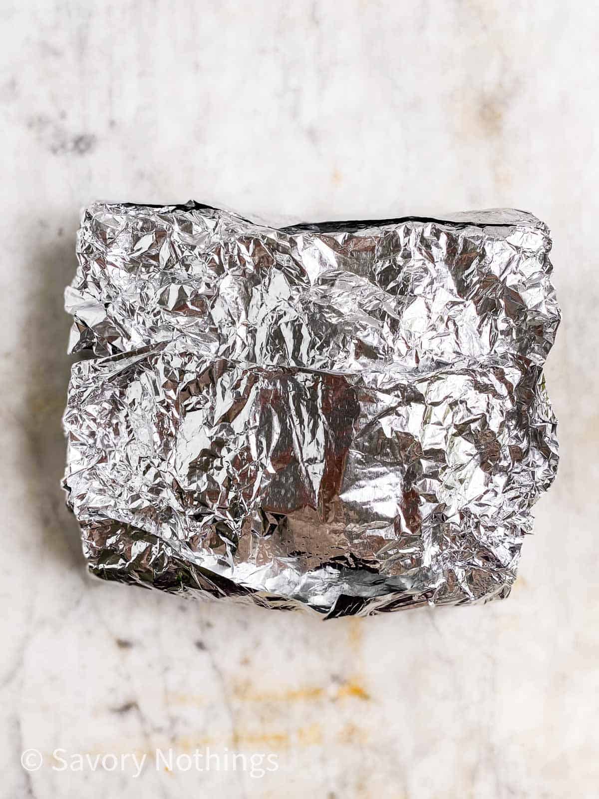 sealed foil pouch on marble surface