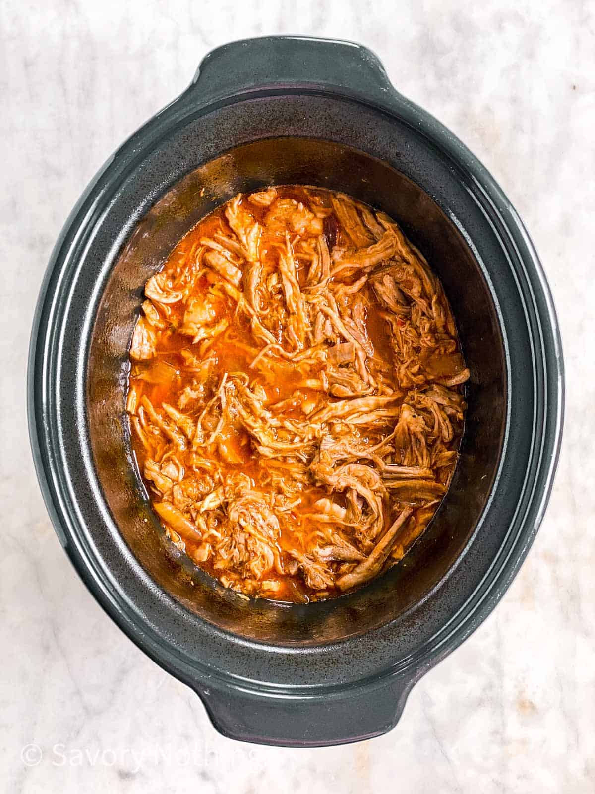 pineapple pulled pork in black crock