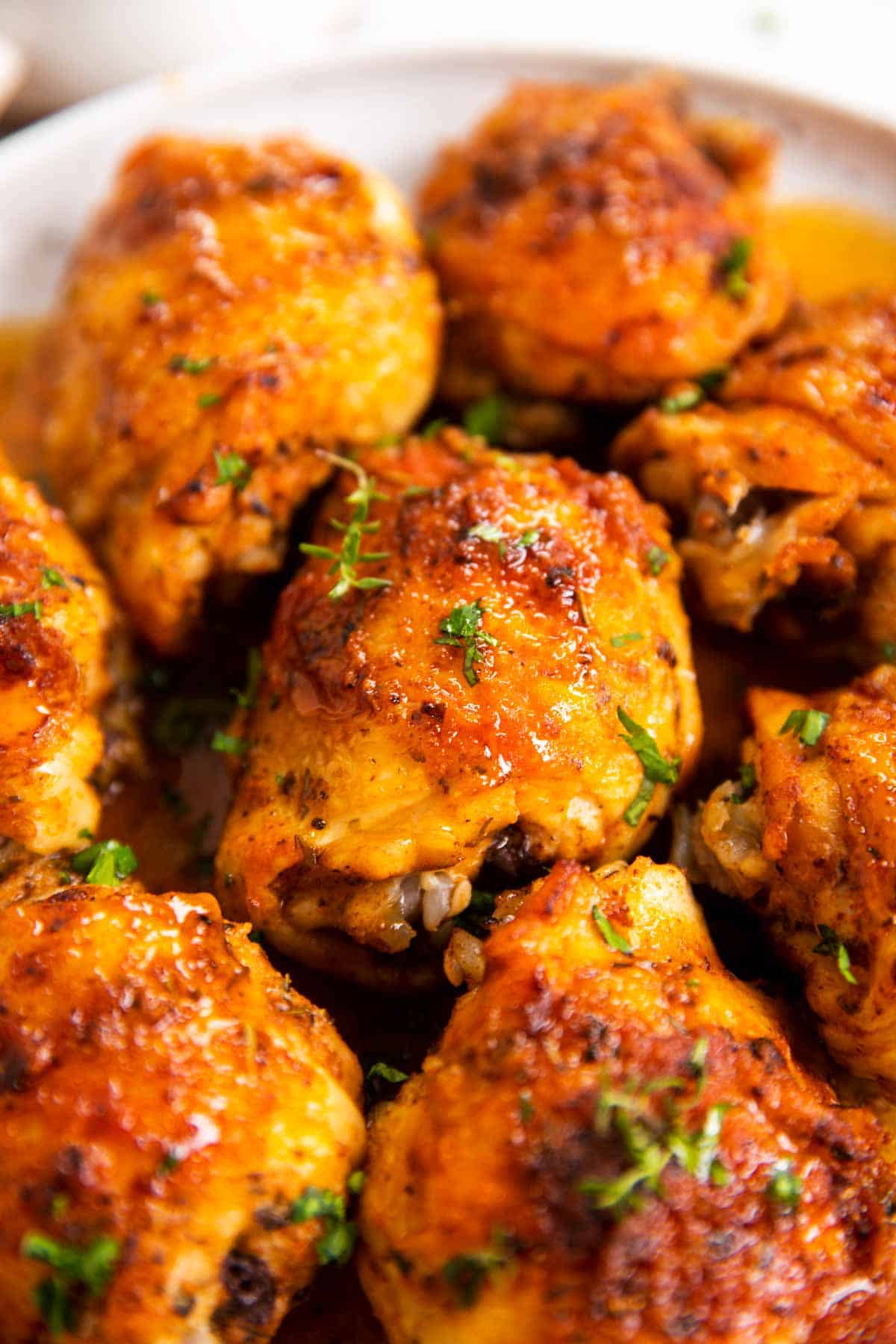 close up photo of instant pot chicken thighs and gravy on plate