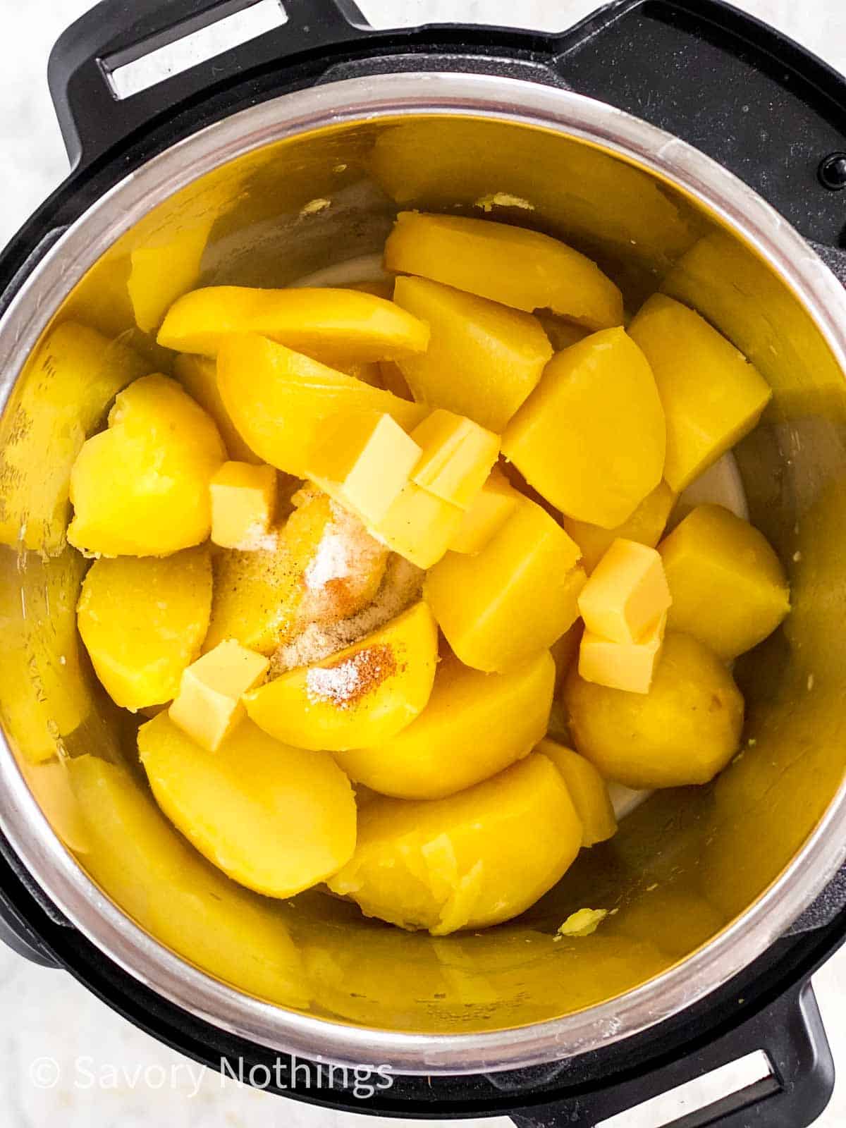 cooked potatoes in instant pot with milk, butter and seasoning