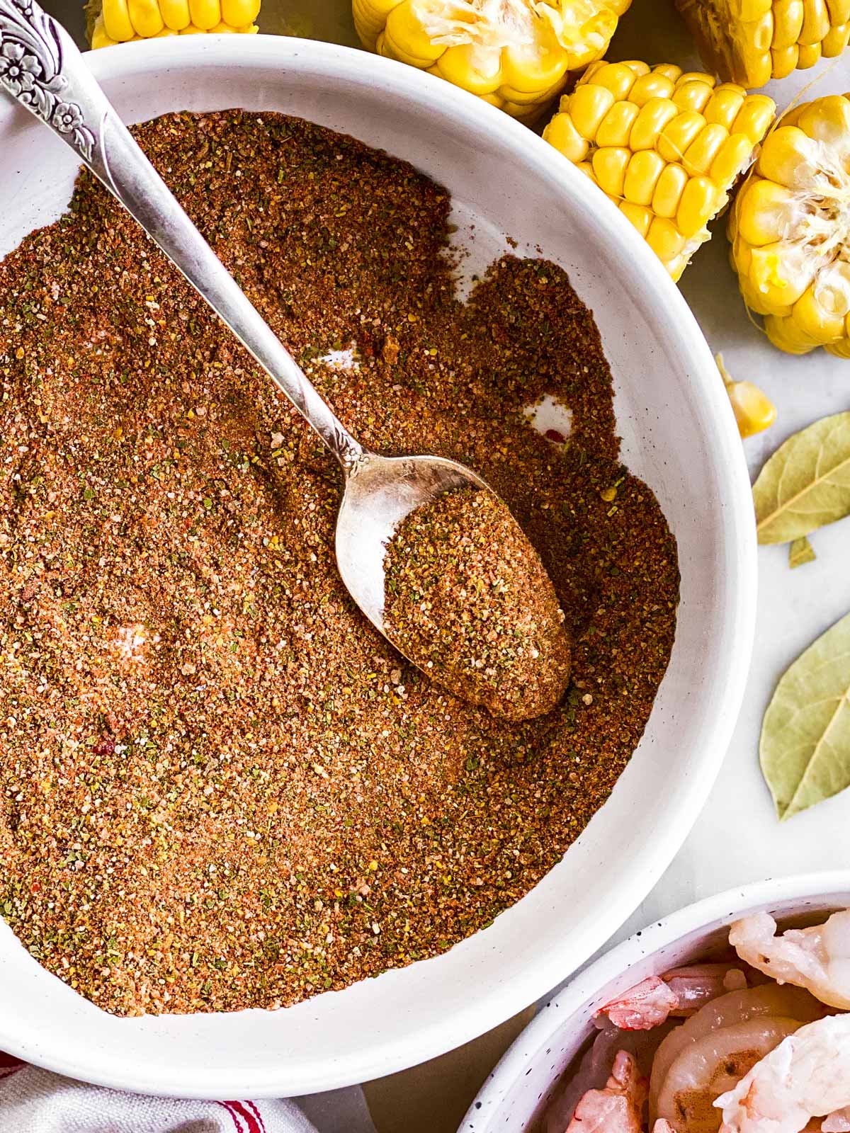 close up photo of spoon in bowl with copycat old bay seasoning