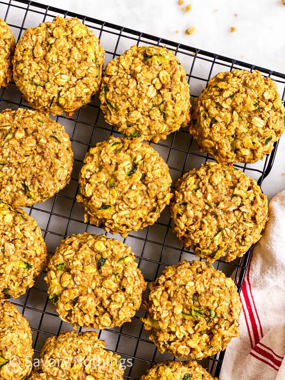overhead view of baked zucchini bread breakfast cookies on cooling rack