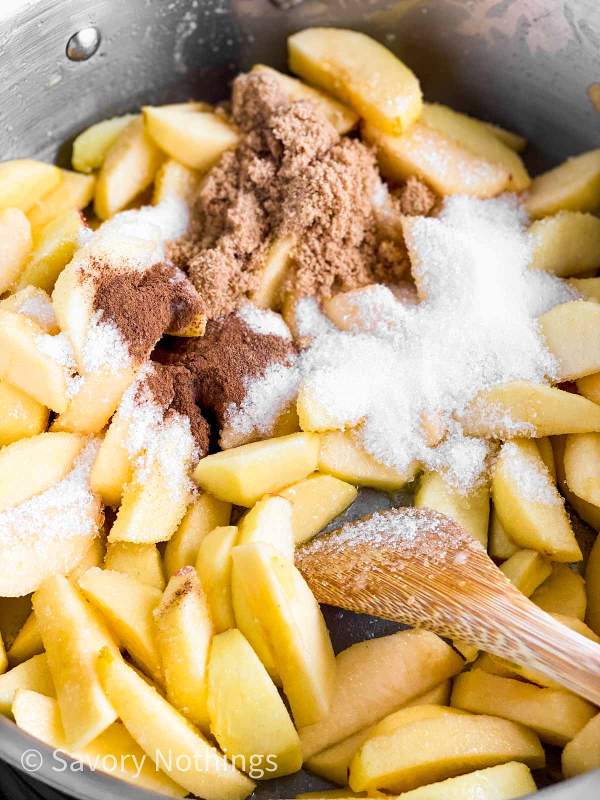 close up photo of sautéed apples with sugar and cinnamon