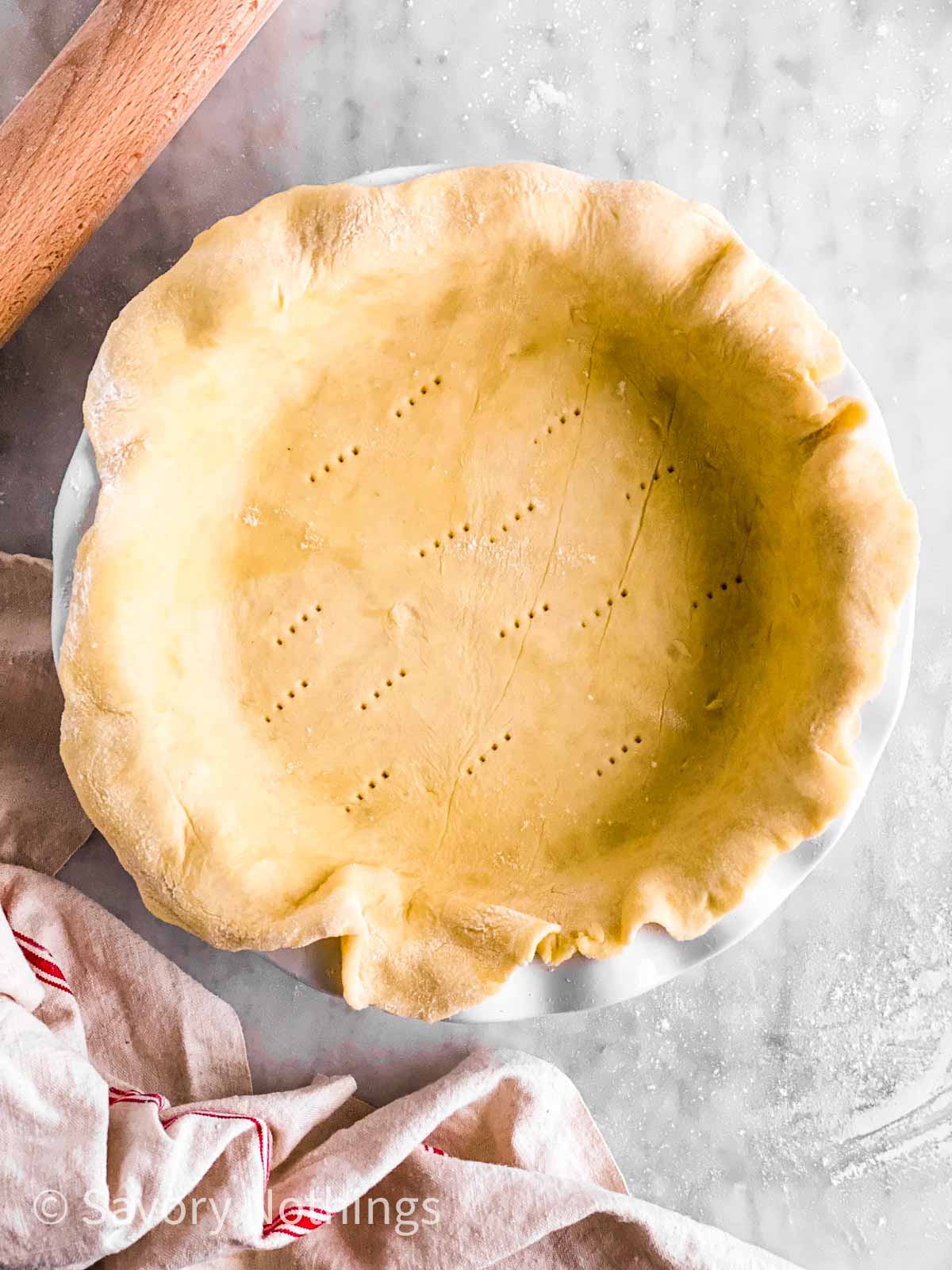 unbaked pie crust in pie plate