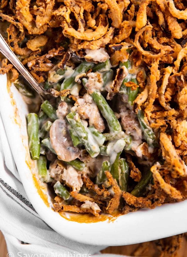 overhead view of green bean casserole with spoon stuck inside