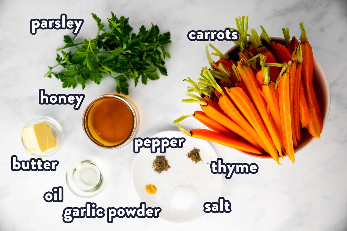 ingredients for honey roasted carrots with text labels