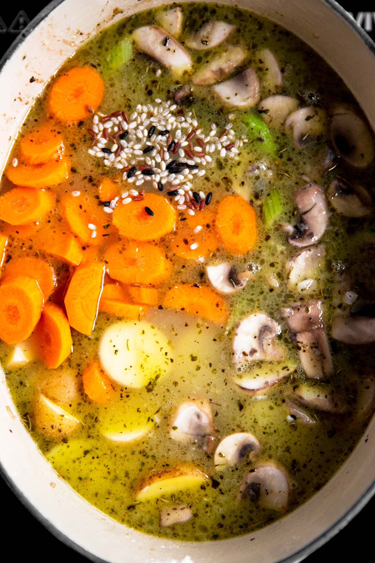 ingredients for turkey soup in Dutch oven