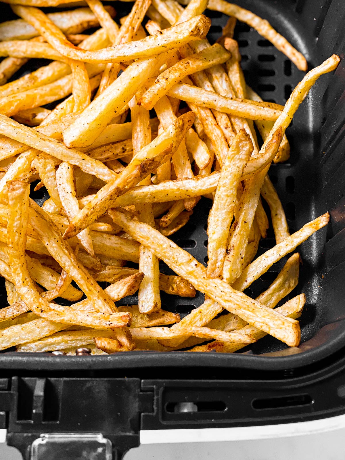 cooked fries in air fryer basket