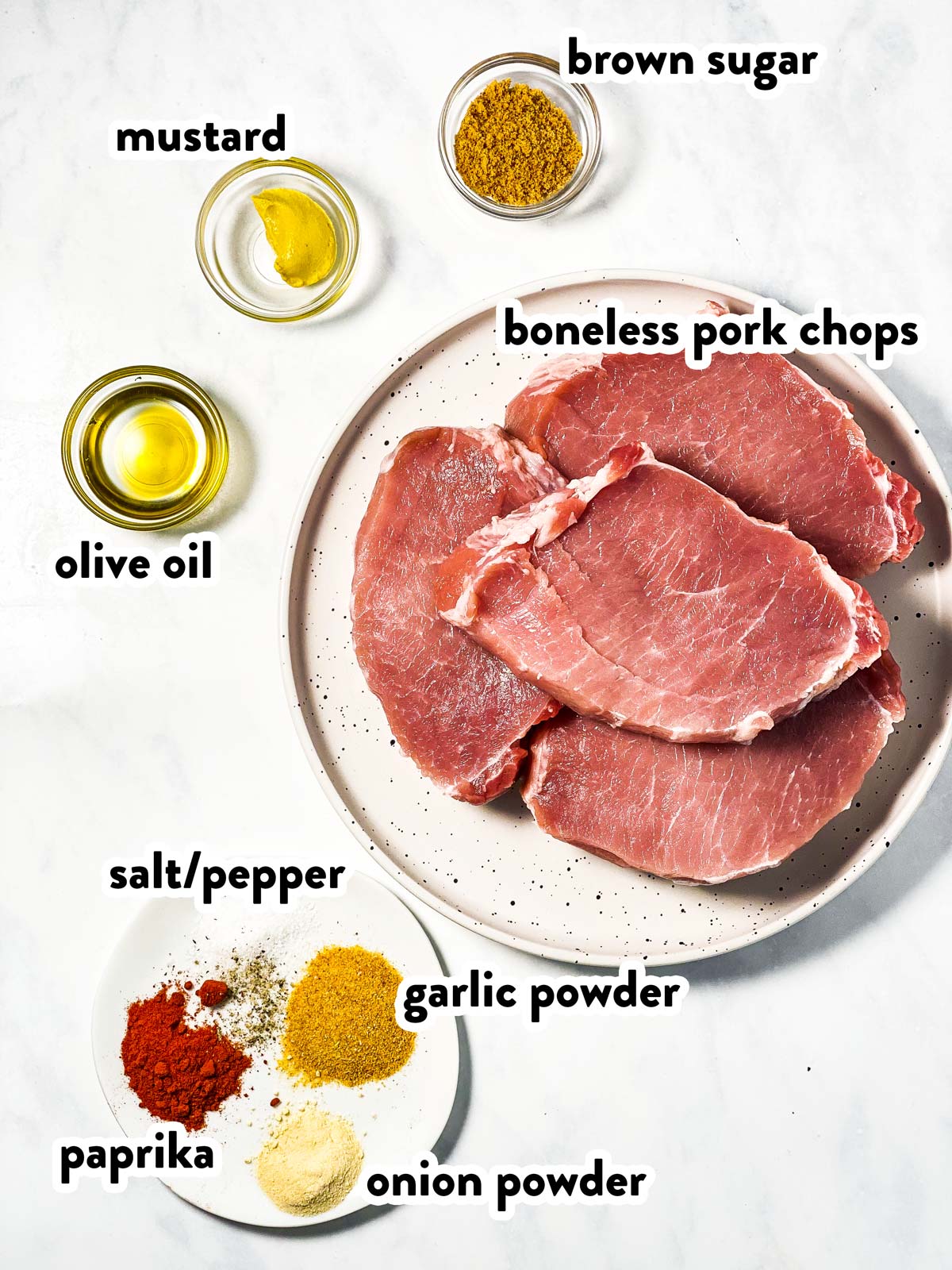 ingredients for oven baked pork chops with text labels
