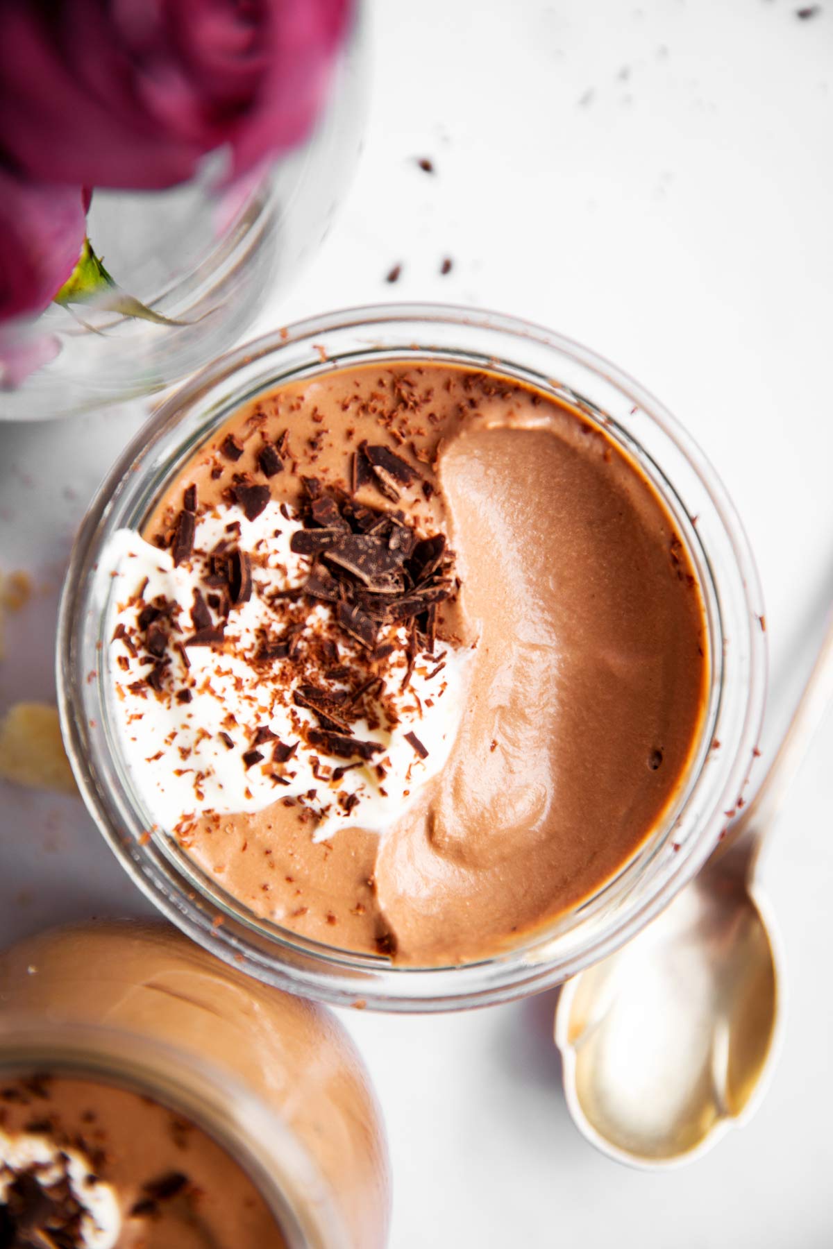 overhead view of tiramisu chocolate mousse with a spoonful eaten