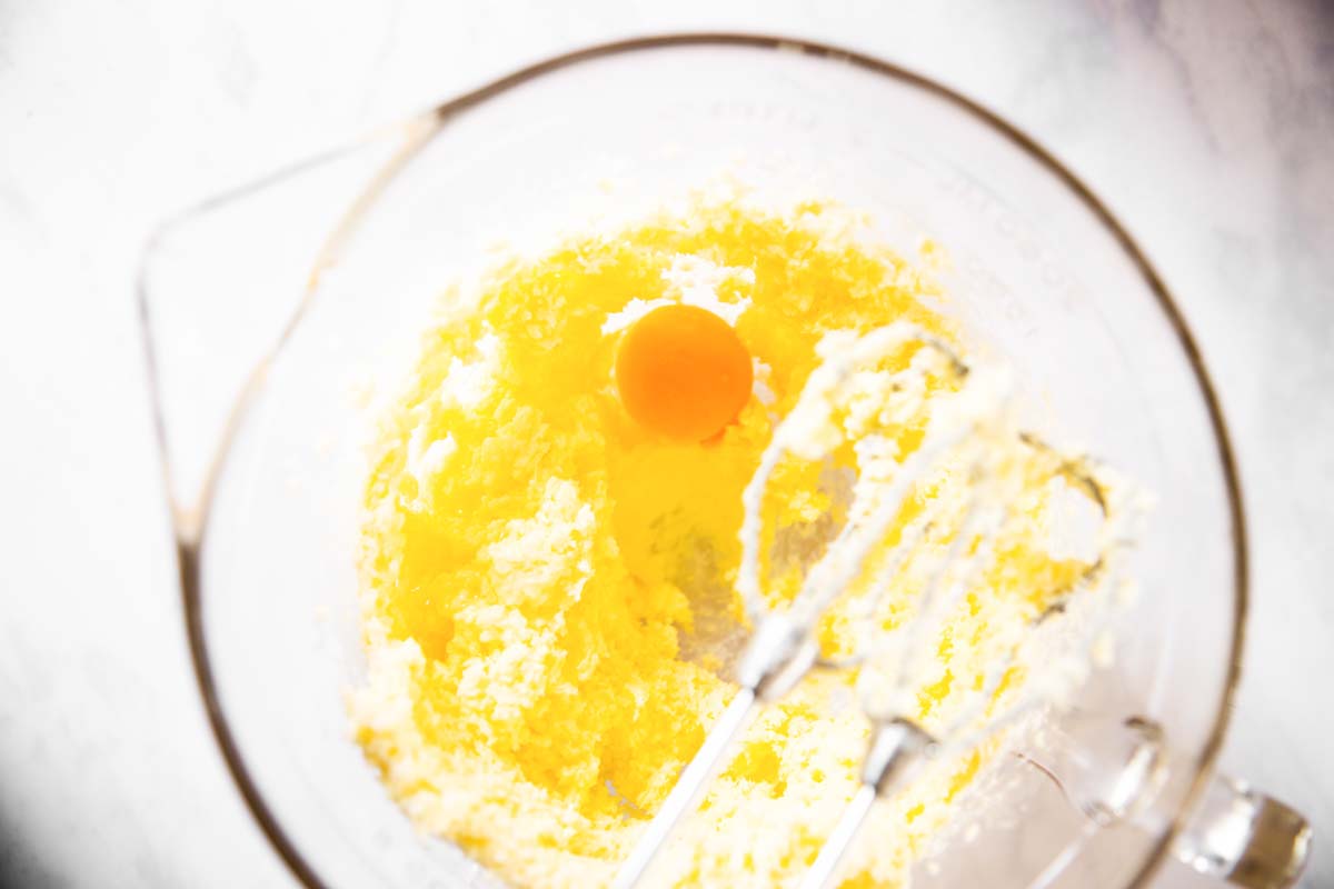 glass bowl with creamed butter and egg on top