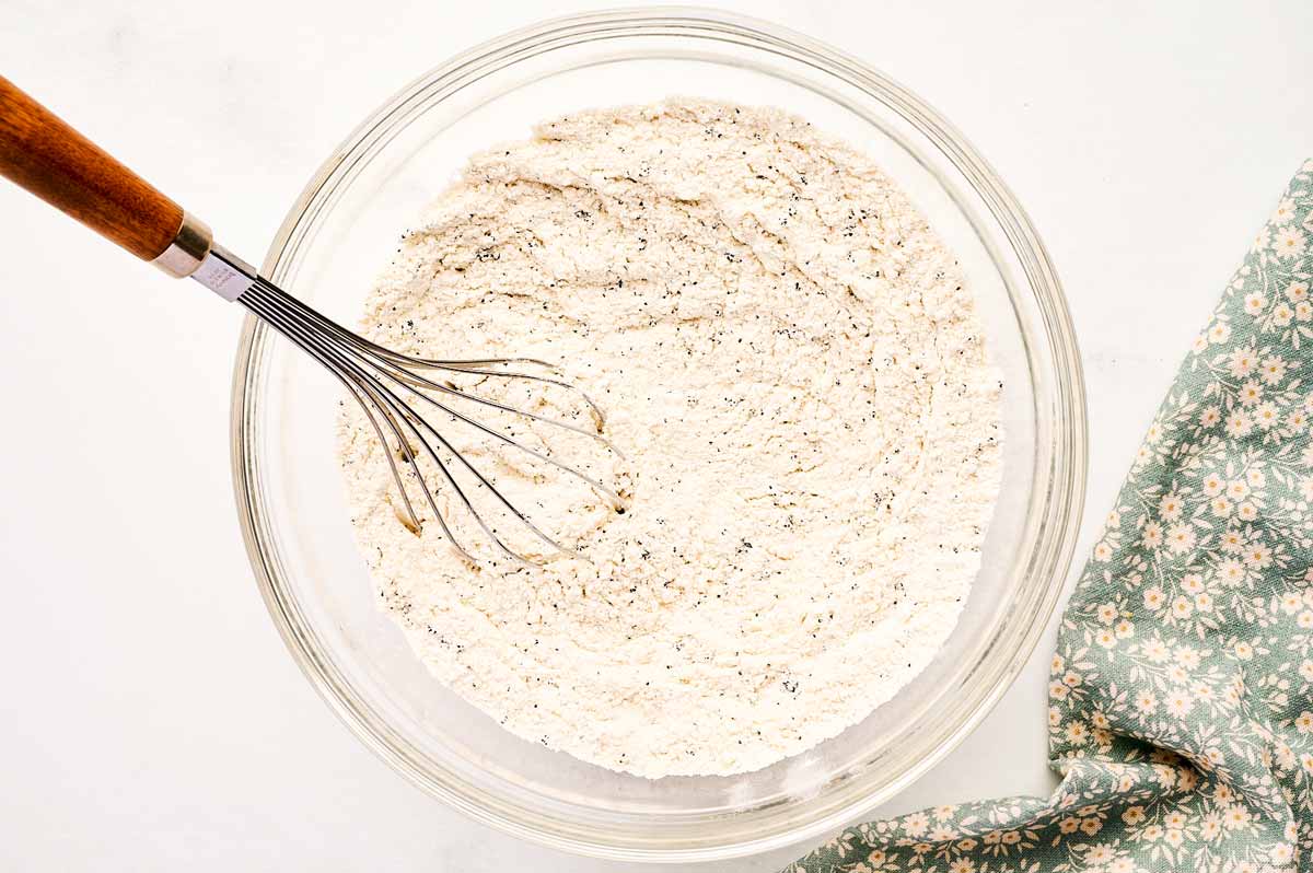 Whisking dry ingredients for lemon poppy seed muffins.