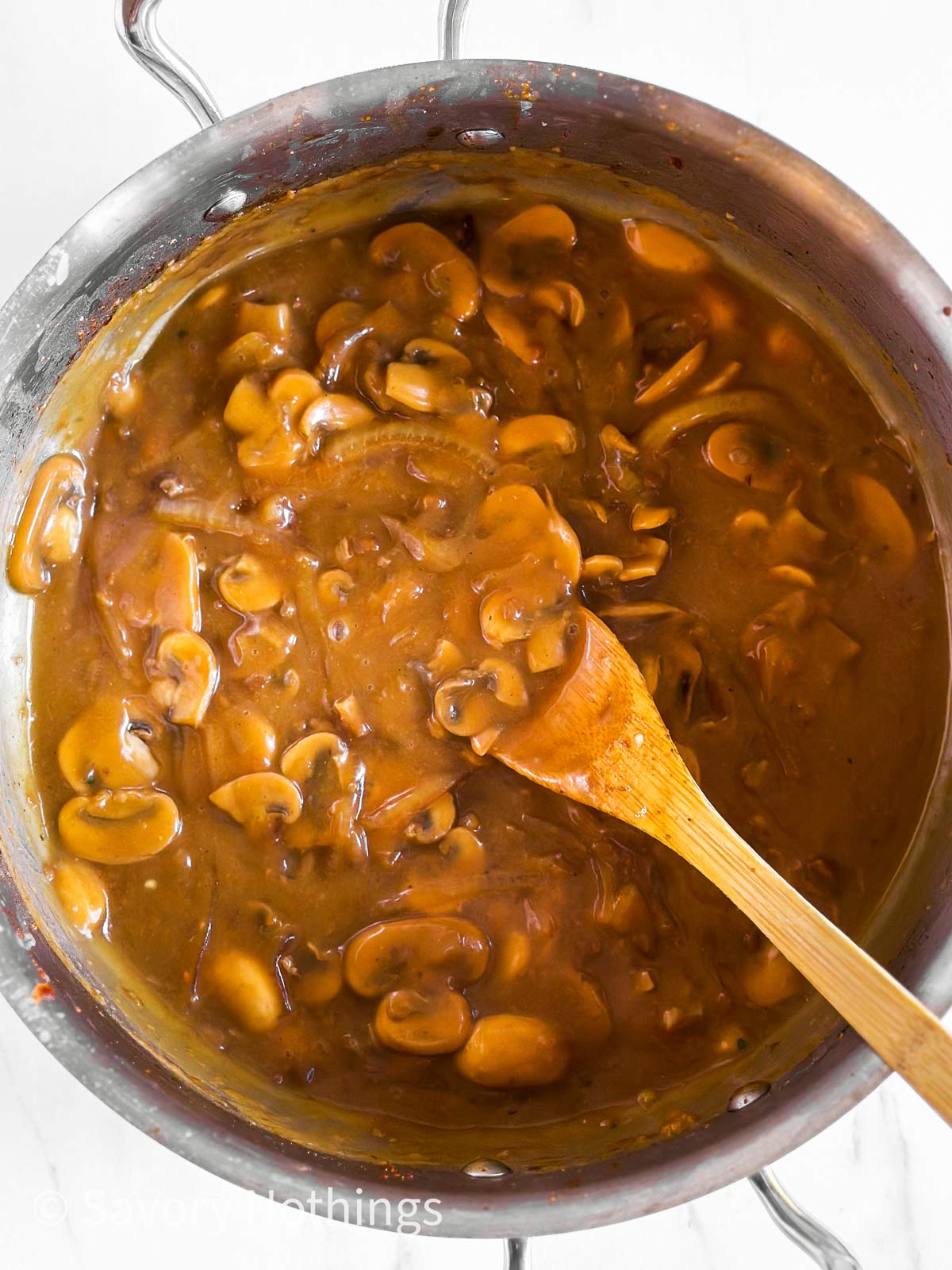 overhead view of mushroom gravy in skillet