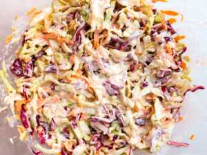 overhead view of chilled coleslaw in glass bowl