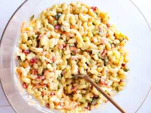 overhead view of macaroni salad in glass bowl
