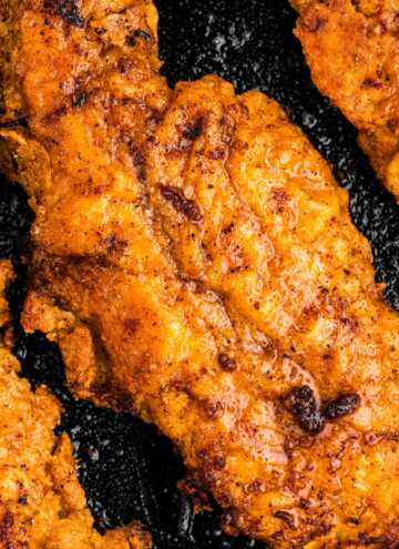 overhead close up view of fried chicken piece