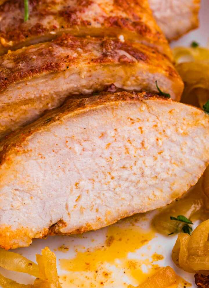 frontal view of sliced baked pork tenderloin