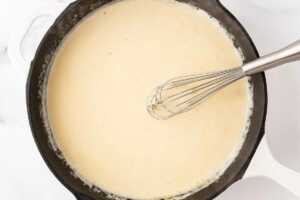overhead view of cream sauce in skillet