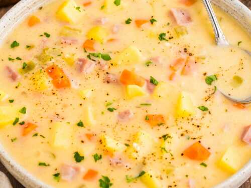 frontal view of ham and potato soup in bowl