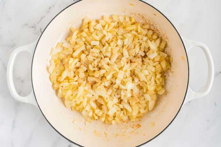 overhead view of cooked onion in pot
