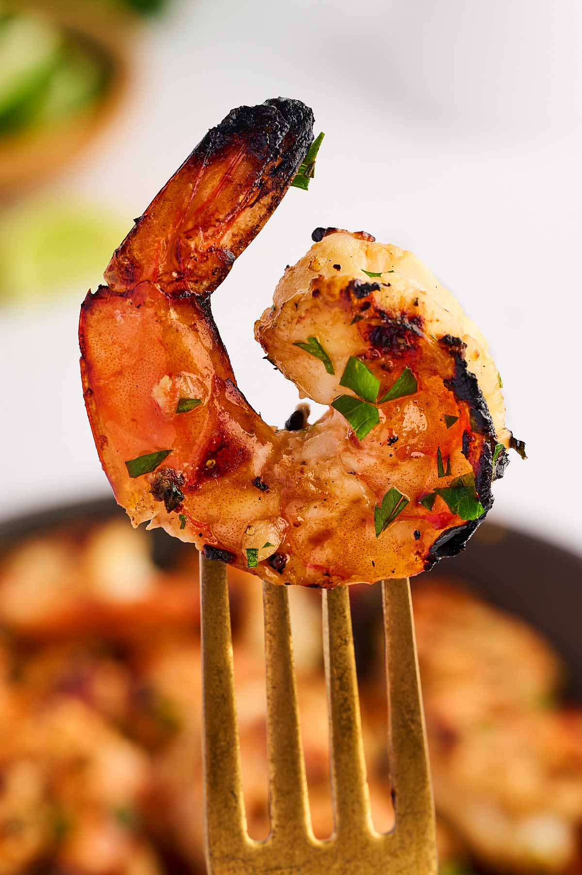 grilled shrimp on fork