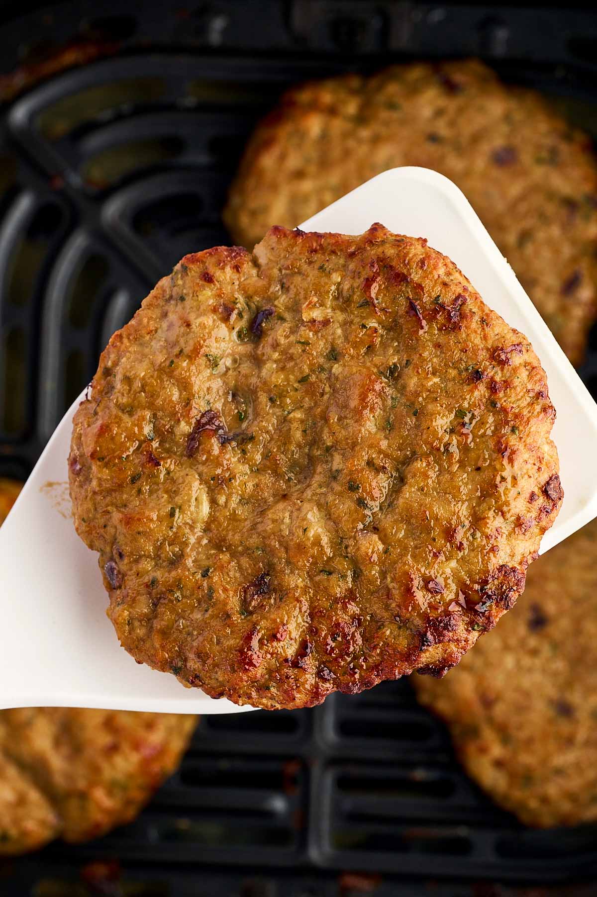 turkey burger on spatula