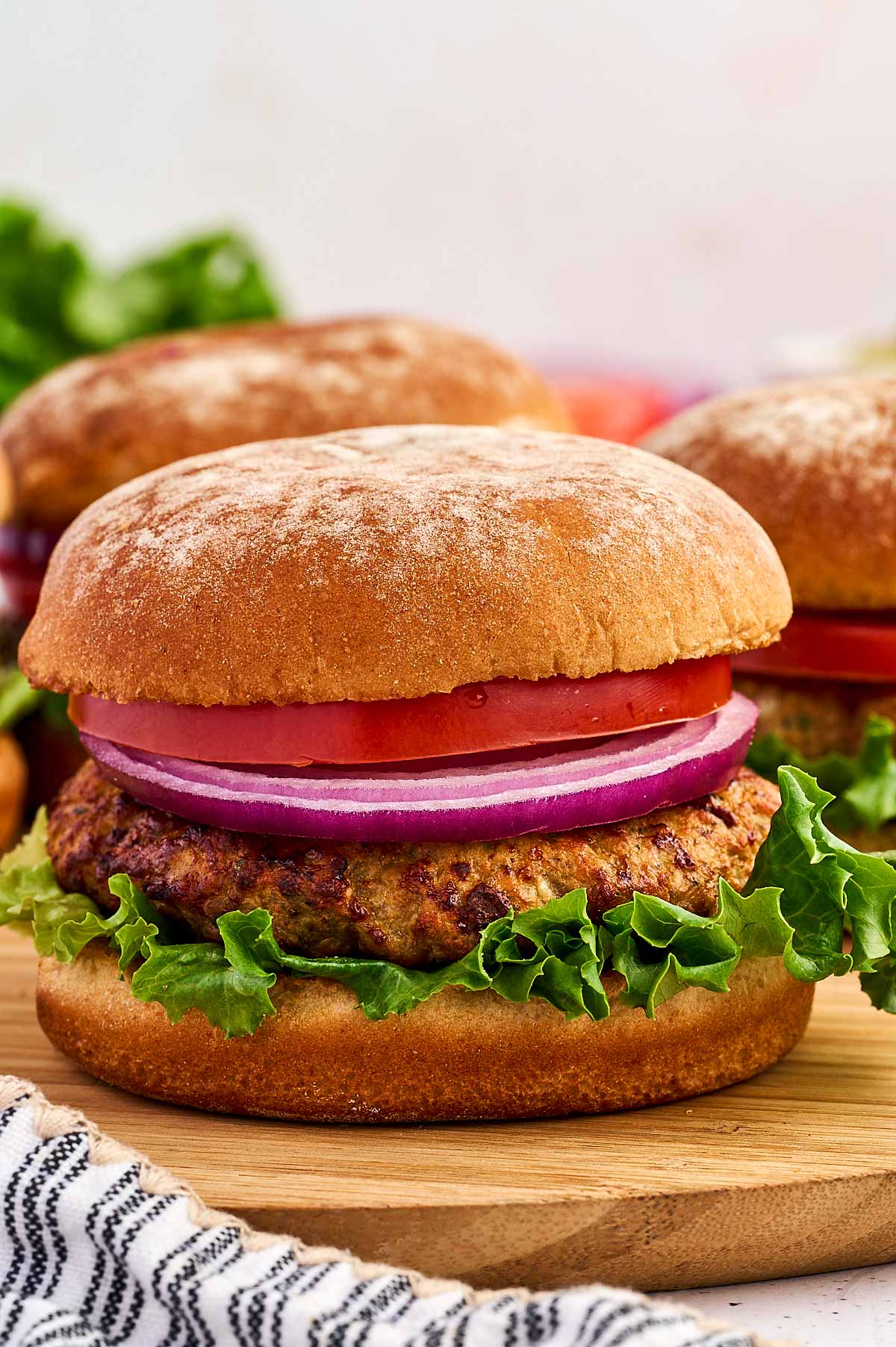 turkey burger on wooden board
