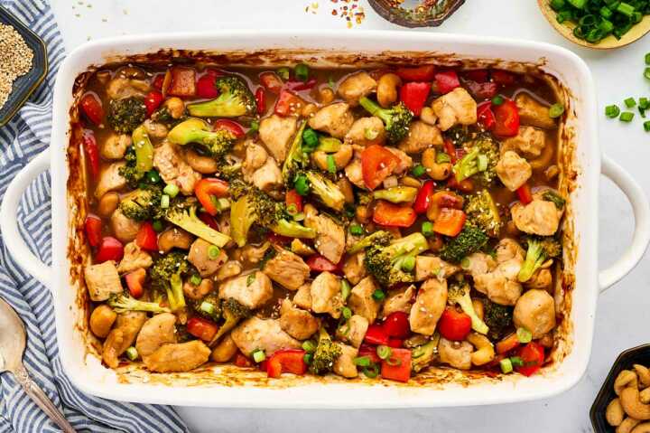 baked cashew chicken in white dish