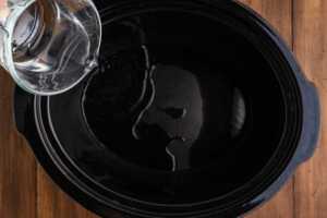 pouring water in crock