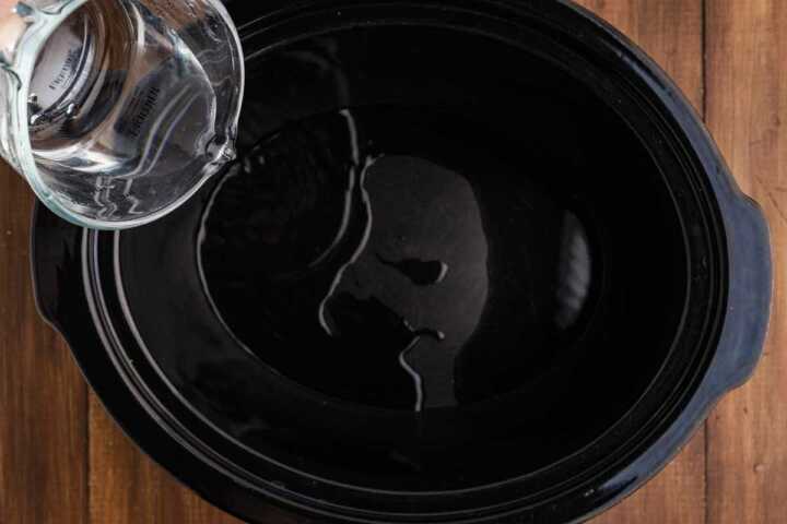 pouring water in crock