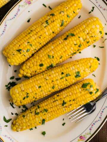 corn on the cob on platter