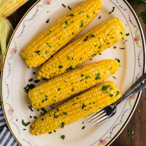 corn on the cob on platter