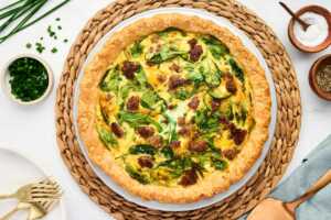 sausage spinach quiche being served