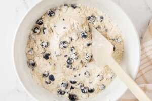 dry ingredients for sour cream blueberry muffins with blueberries tossed in