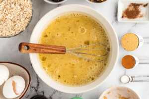 mix of wet ingredient for baked oatmeal cups