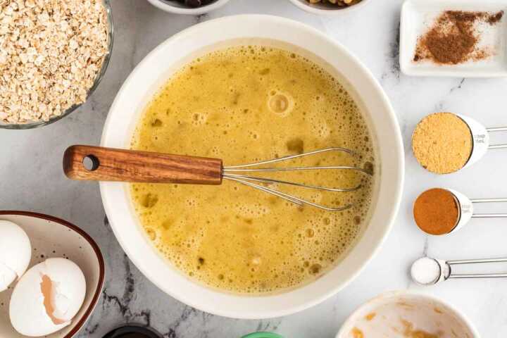 mix of wet ingredient for baked oatmeal cups