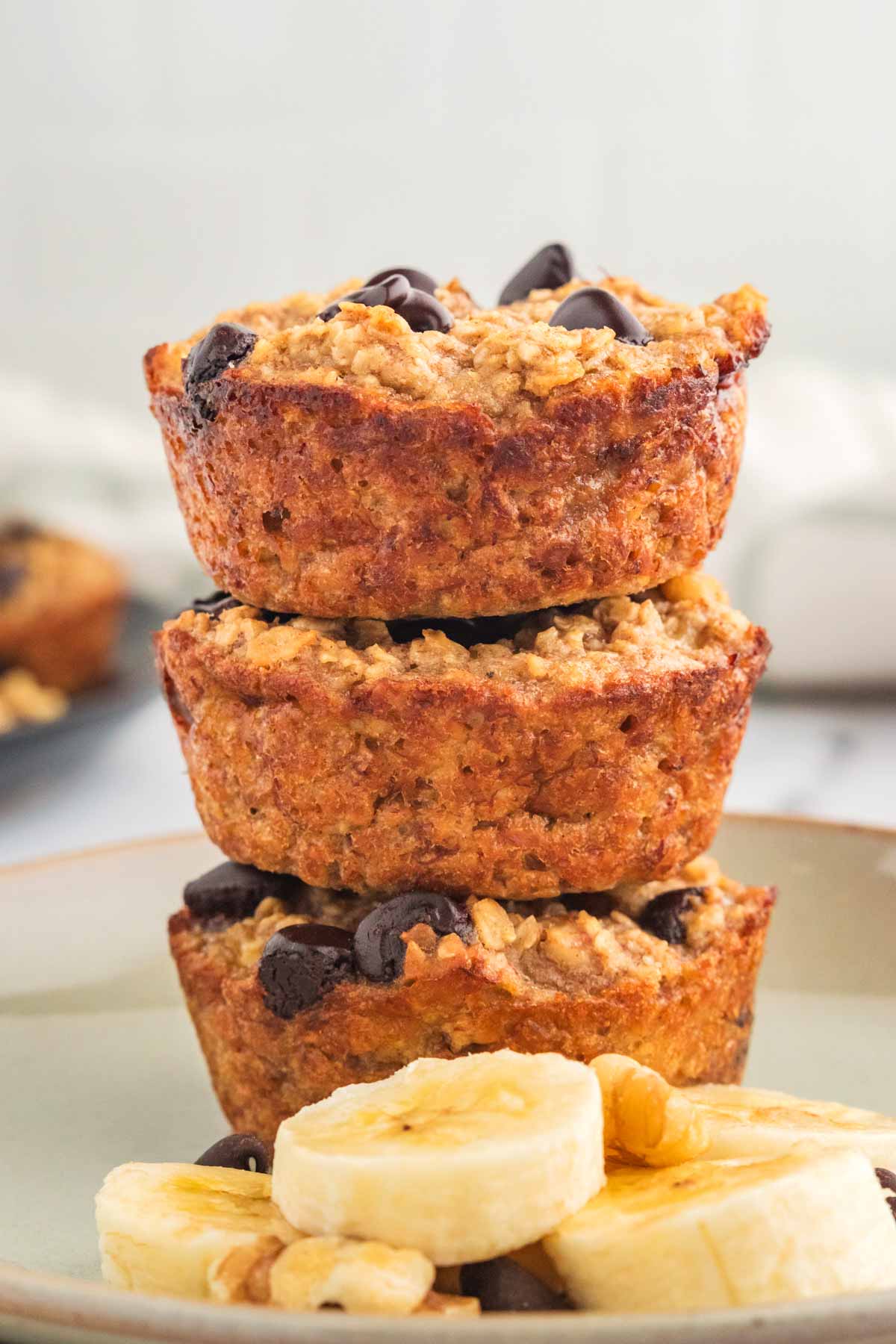 baked oatmeal cups stacked on plate