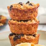 baked oatmeal cups stacked on plate