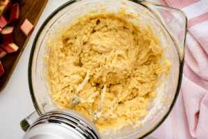 rhubarb coffee cake batter in glass bowl
