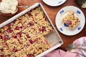 rhubarb coffee cake being served on a wooden table