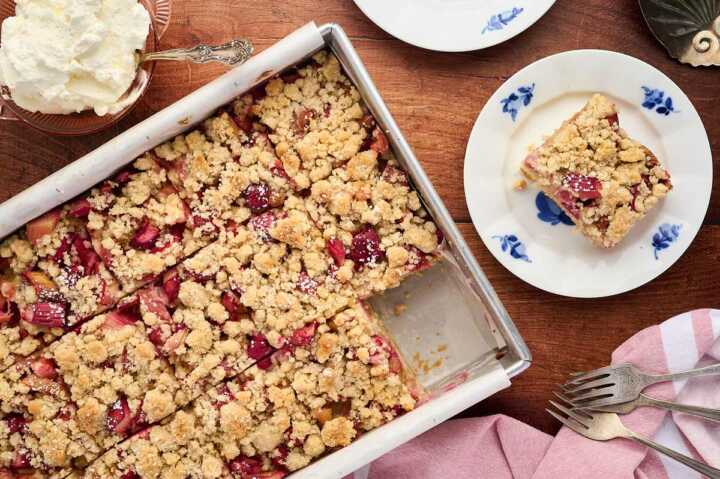 rhubarb coffee cake being served on a wooden table