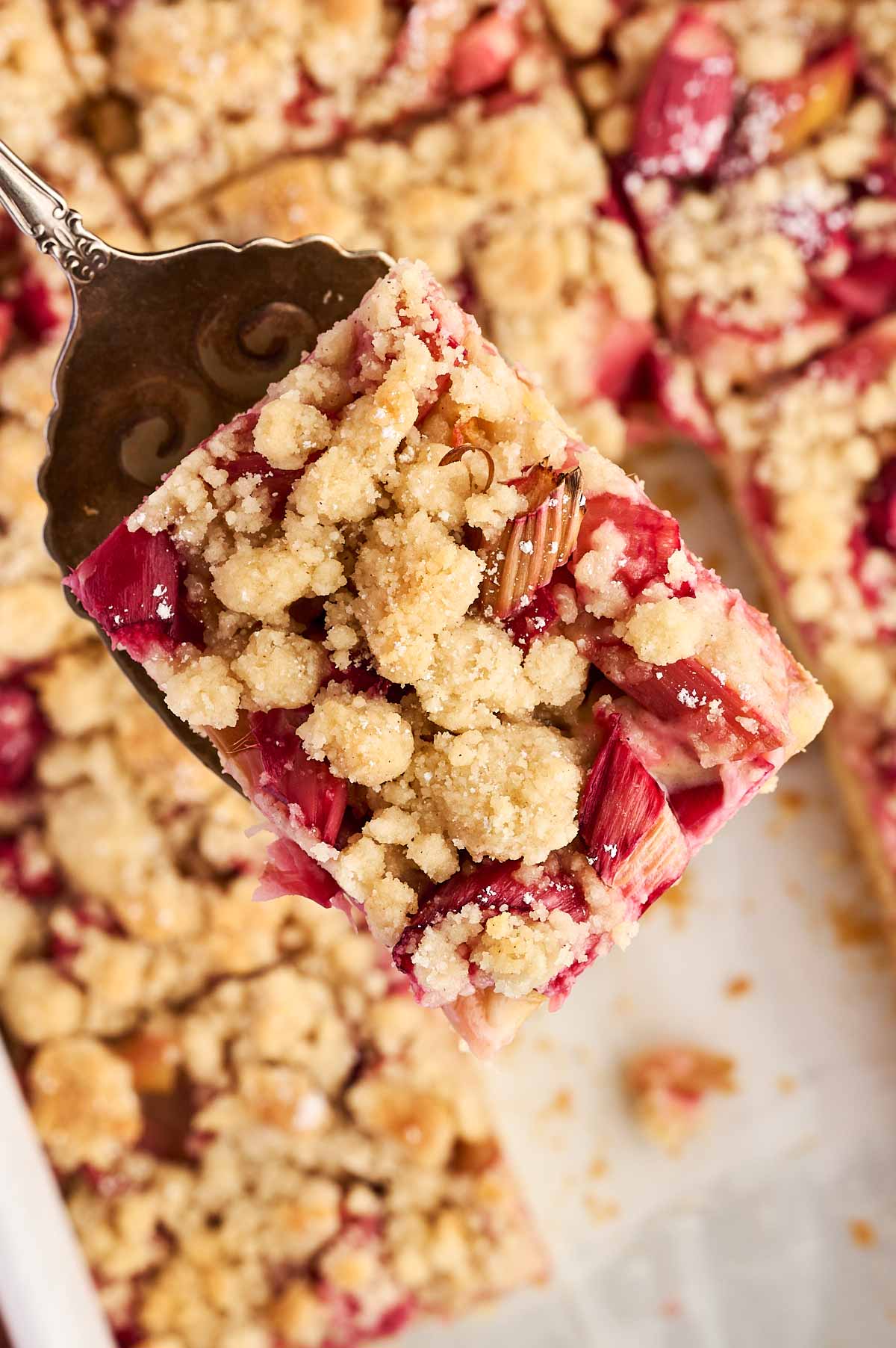 slice of rhubarb coffee cake being served