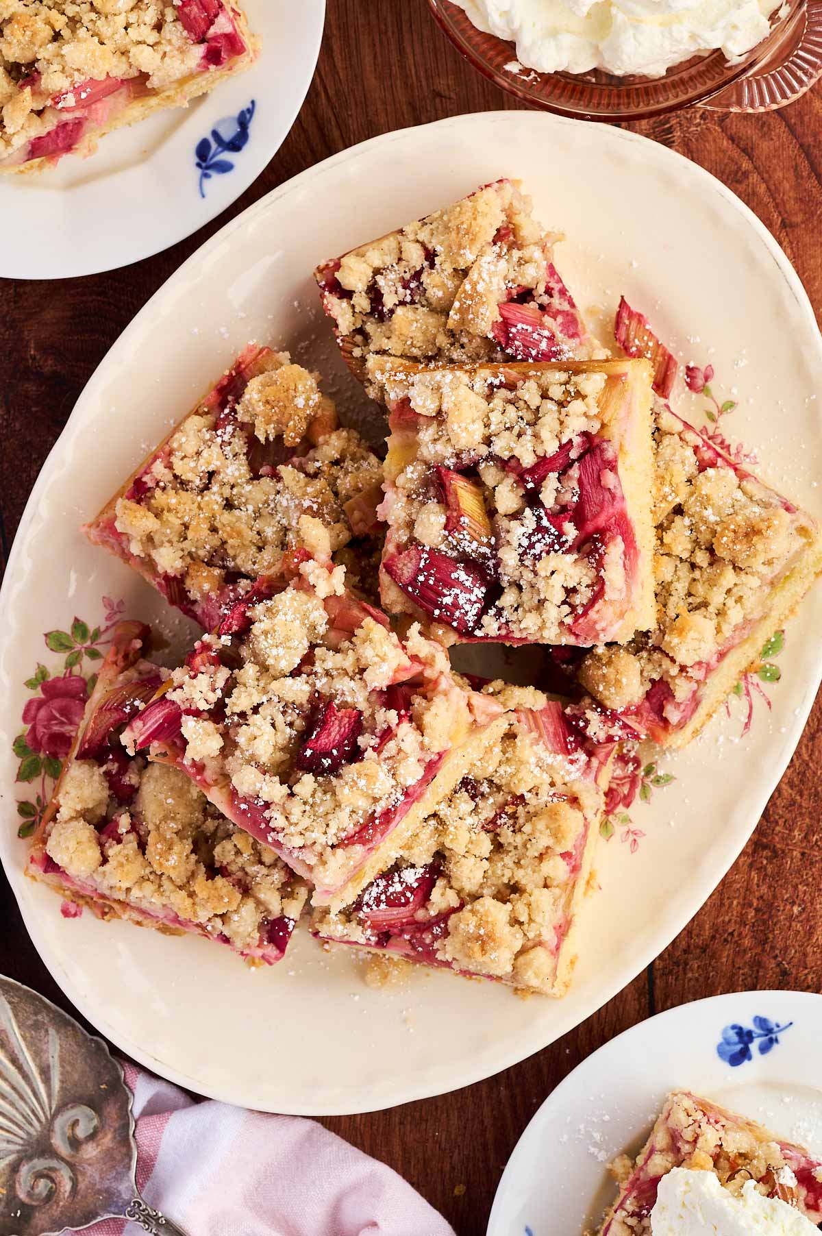 slices of rhubarb cake on platter