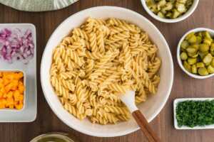 cooked pasta mixed with pickle juice