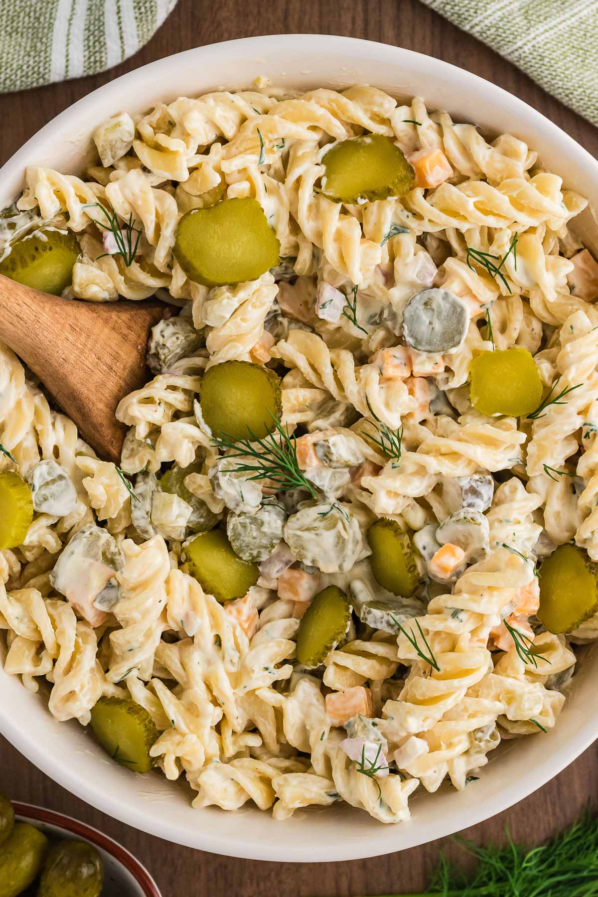 close up view of dill pickle pasta salad in bowl